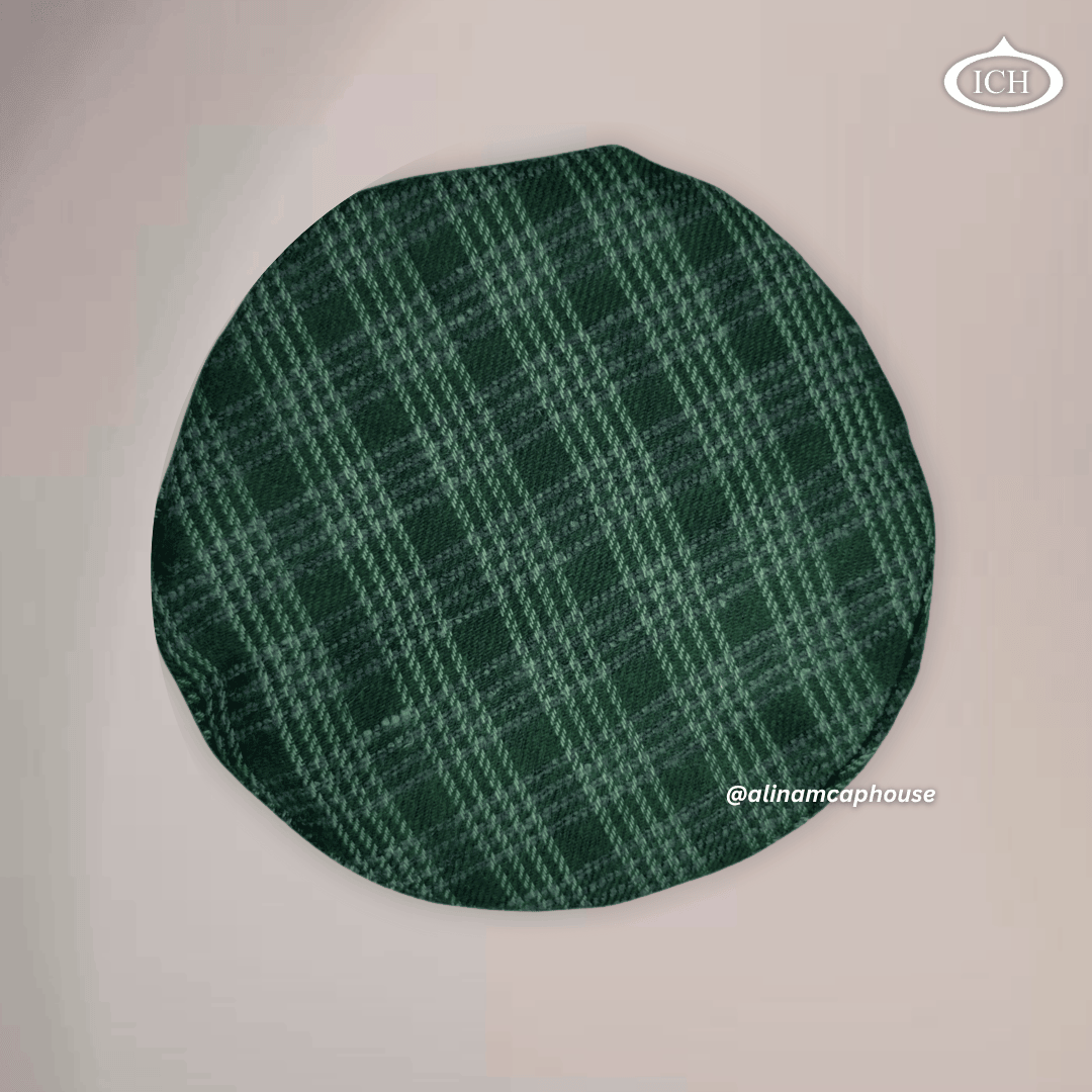 green Islamic Afghani topi, circular top view, textured fabric, prayer cap