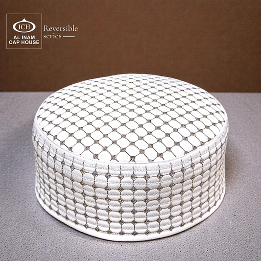 Top-front angle of AL INAM ICH Reversible Prayer Cap showcasing breathable cotton fabric, clean stitching, and structured Islamic design.