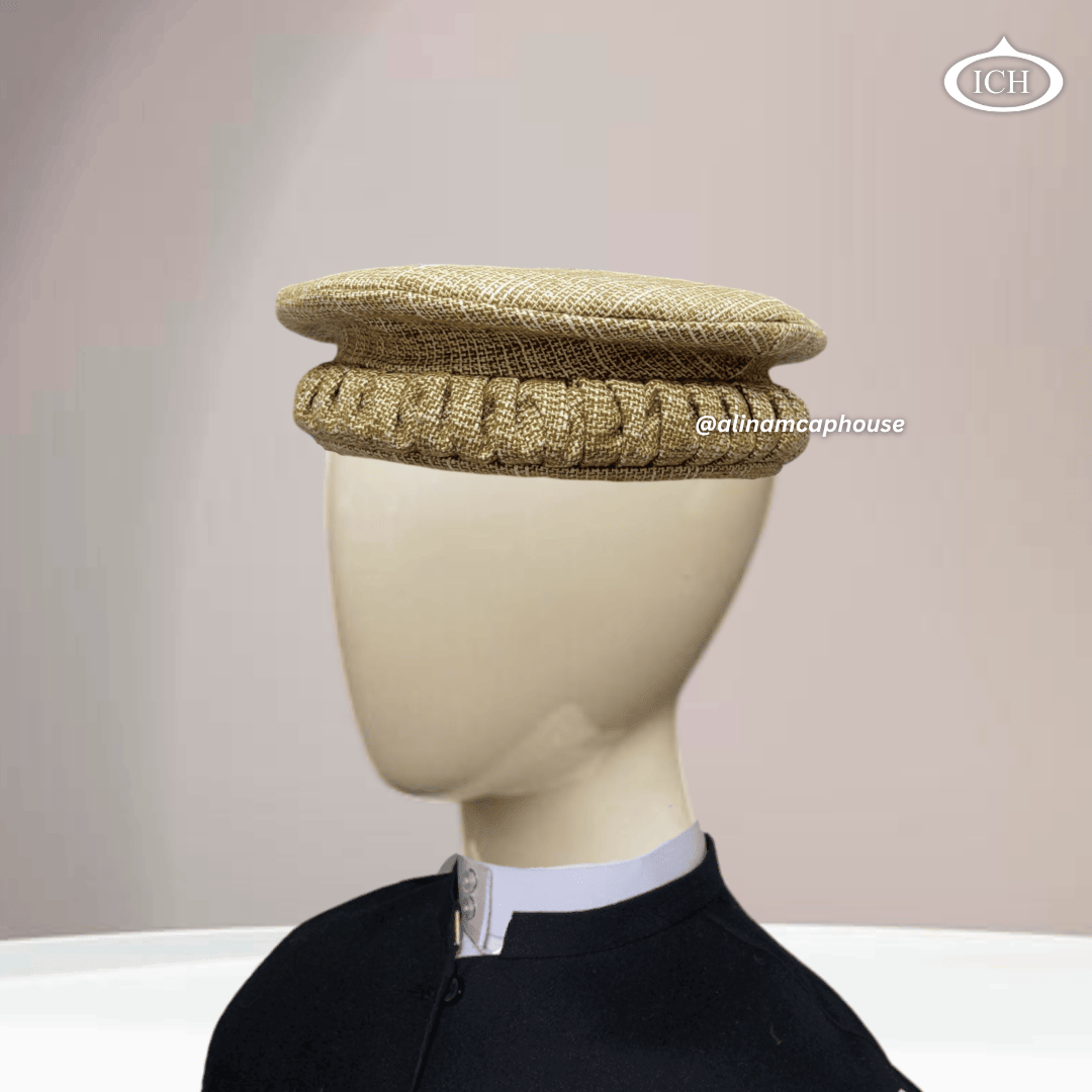 light brown Afghani cap at angle, elegant texture, Afghan style Islamic cap