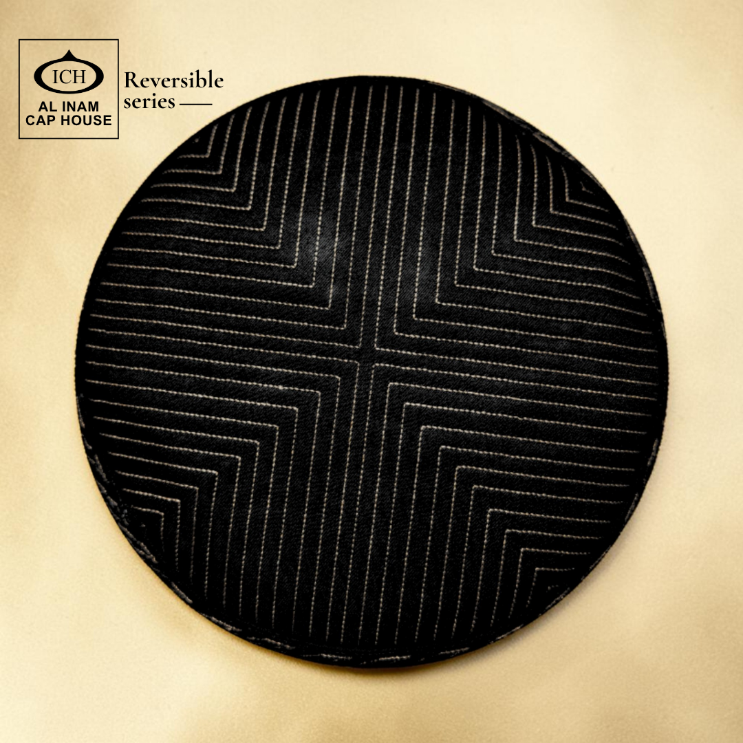 AL INAM black and golden Islamic skull cap top view featuring geometric woven design – stylish reversible prayer cap for everyday ibadah.