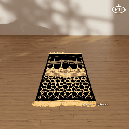 Al Inam Signature Black Janamaz – Soft cushioned prayer mat enhancing devotion and spiritual focus during prayer.