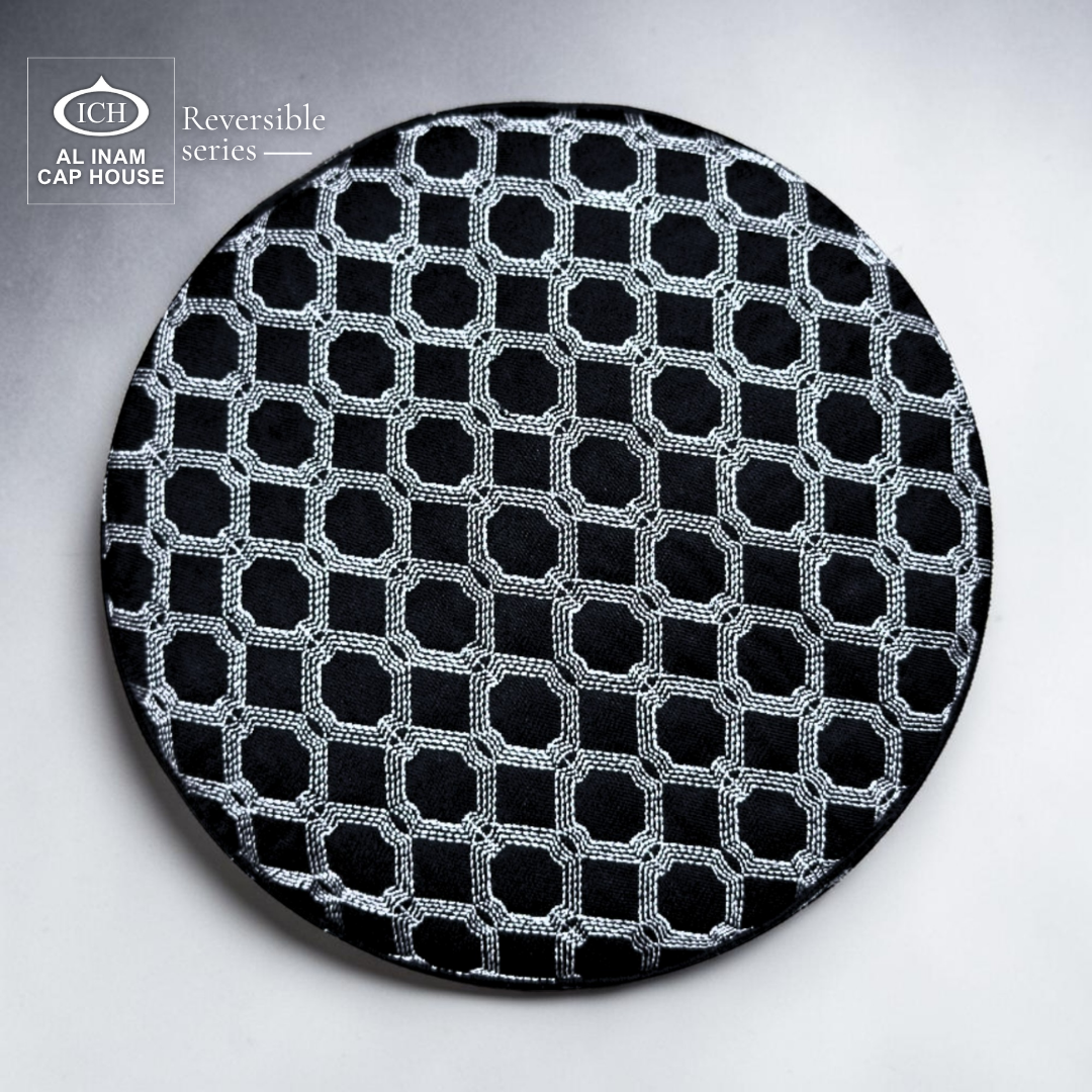 AL INAM black and silver Islamic skull cap top view featuring intricate geometric pattern – stylish reversible prayer cap for everyday ibadah.