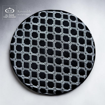 AL INAM black and silver Islamic skull cap top view featuring intricate geometric pattern – stylish reversible prayer cap for everyday ibadah.