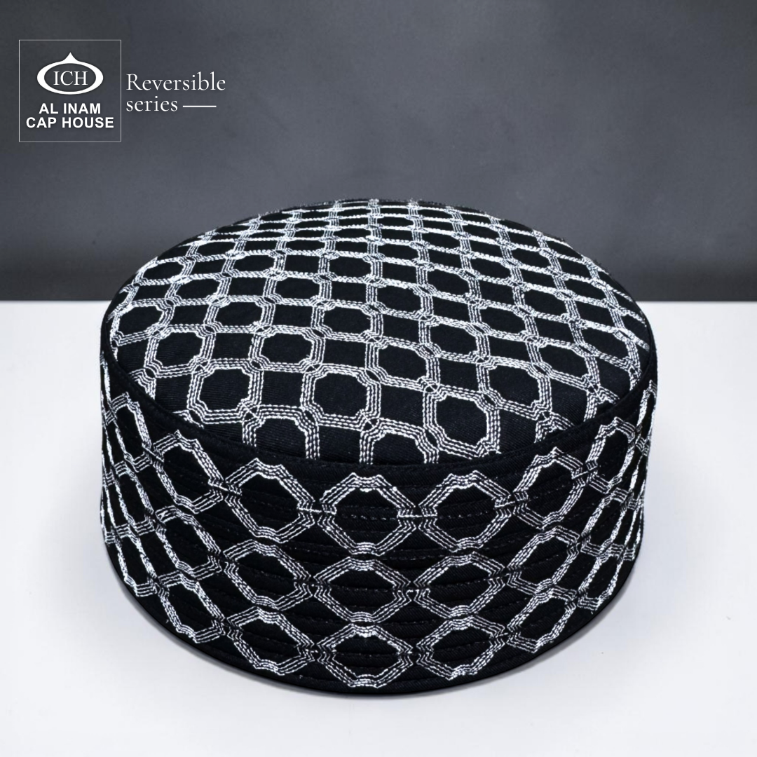 AL INAM black and silver reversible kufi cap FRONT / MAIN VIEW showcasing detailed stitching and refined finish – breathable Islamic prayer topi for comfort and style.