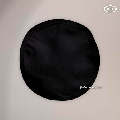 Black Islamic Kabuli topi, circular top view, blazer fabric texture, men's prayer cap