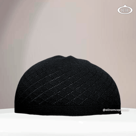 N06 black, Islamic prayer cap, front view, soft breathable fabric, subtle texture, AL INAM CAP HOUSE