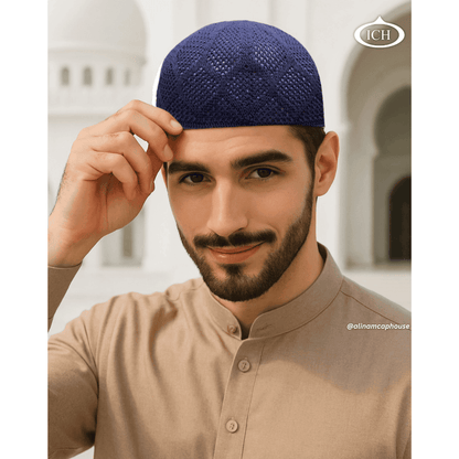 N05 blue, Islamic prayer cap, angled view on model, refined silhouette, comfortable fit, AL Inam Cap House