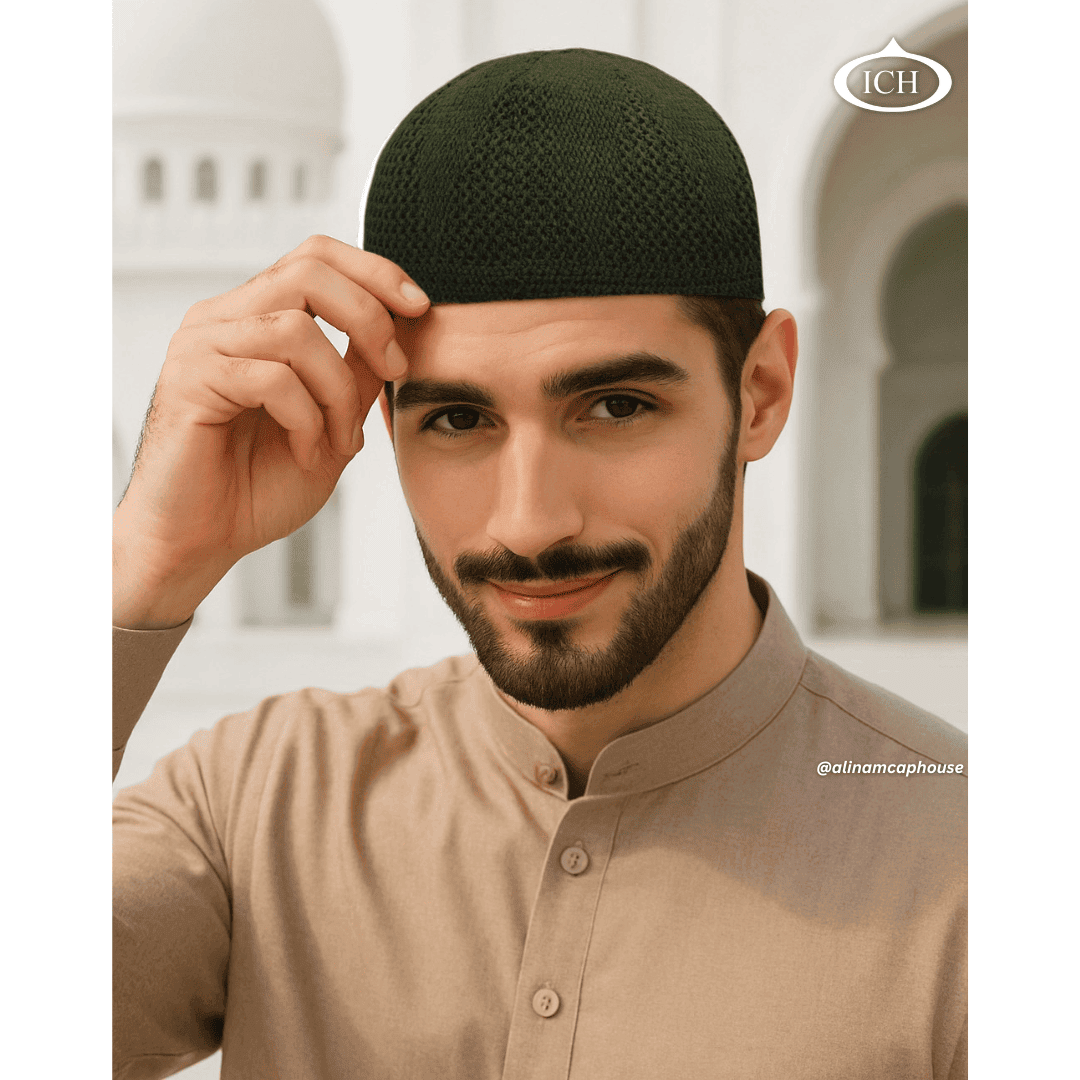 N07 dark green, Islamic prayer cap, angled view on model, elegant design, comfortable fit, AL INAM CAP HOUSE