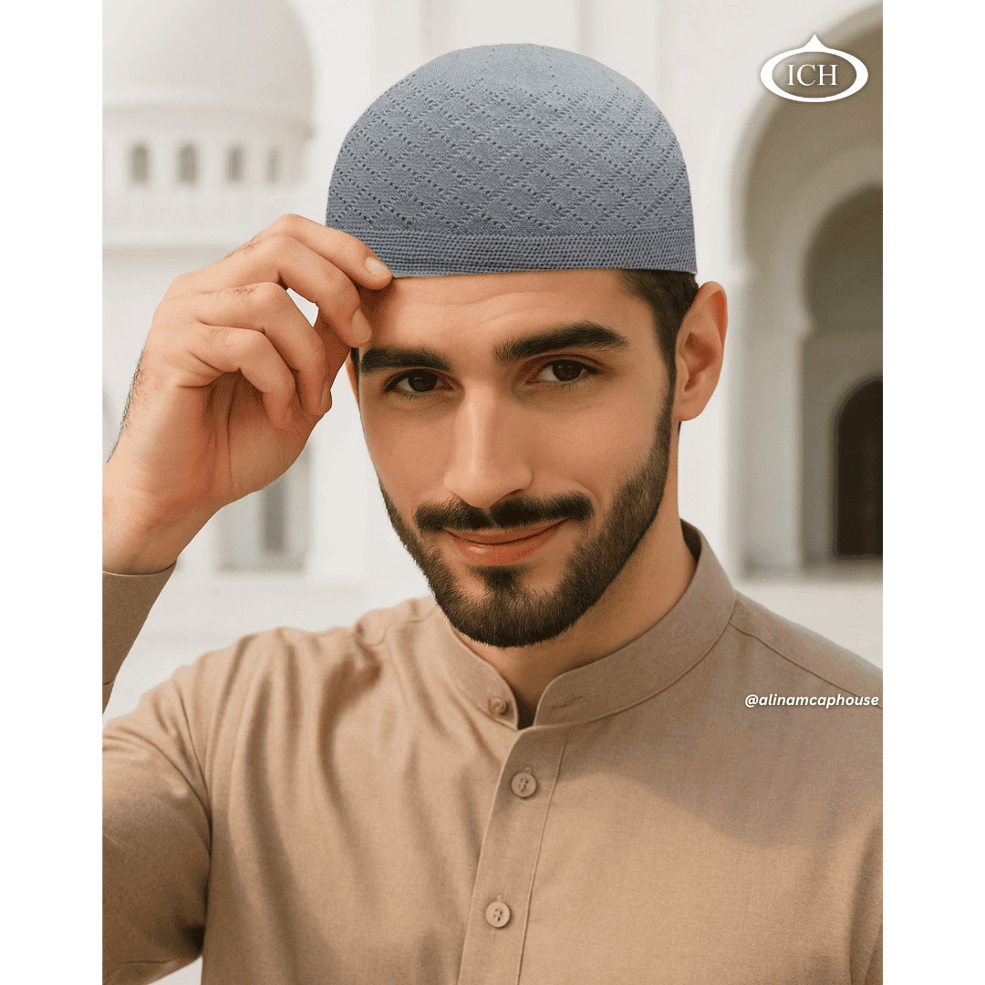 N06 grey, Islamic prayer cap, angled view on model, elegant texture, comfortable fit, AL Inam Cap House