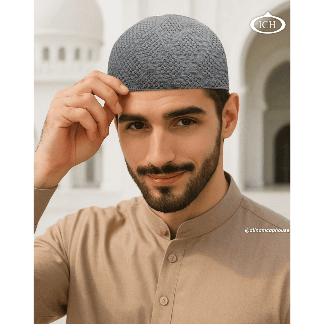 N11 grey Turkish knitted cap, Islamic prayer cap, angled view on model, elegant knit pattern, comfortable fit, AL INAM CAP HOUSE