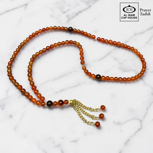 AL INAM CAP HOUSE amber and brown crystal prayer tasbih with gold chain tassel