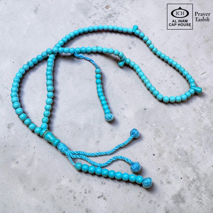 AL INAM CAP HOUSE blue Firoza (Turquoise) prayer beads with metallic tassel, ideal for Islamic dhikr and spiritual practice.
