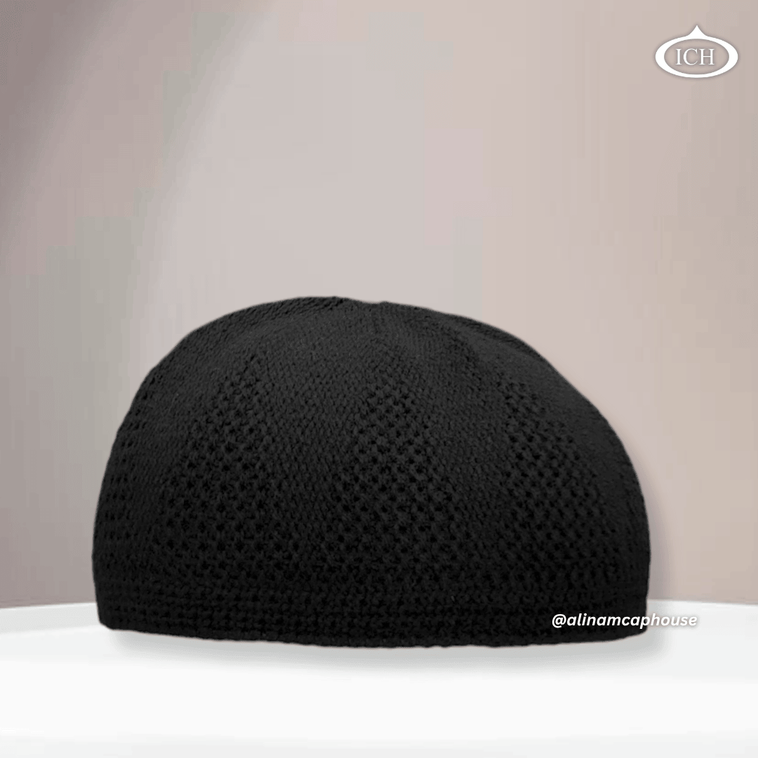 N07 black, Islamic prayer cap, front view, soft breathable fabric, subtle texture, AL INAM CAP HOUSE