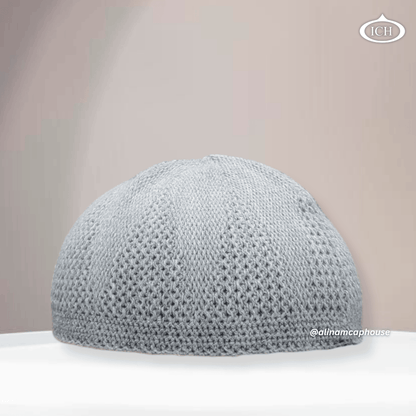 N07 grey, Islamic prayer cap, front view, neutral tone fabric, subtle texture, AL INAM CAP HOUSE
