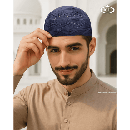 N13 dark blue Turkish knitted cap, Islamic prayer cap, angled view on model, bold knit pattern, comfortable fit, AL INAM CAP HOUSE