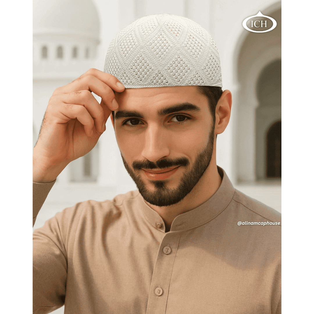 N11 off-white Turkish knitted cap, Islamic prayer cap, angled view on model, refined knit pattern, comfortable fit, AL INAM CAP HOUSE