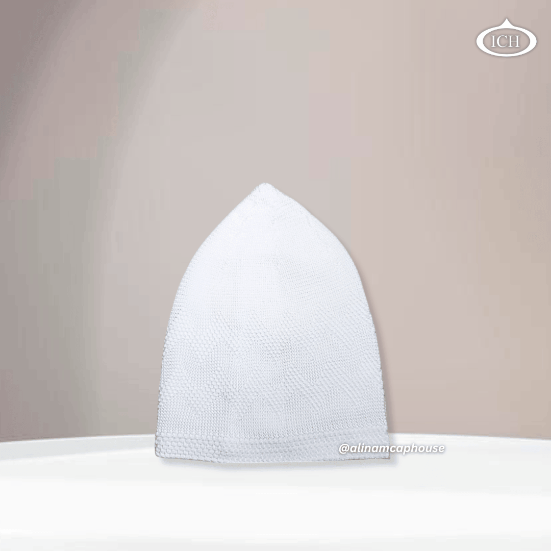 white, Islamic prayer cap, side view, snug fit, handcrafted detail, AL INAM CAP HOUSE