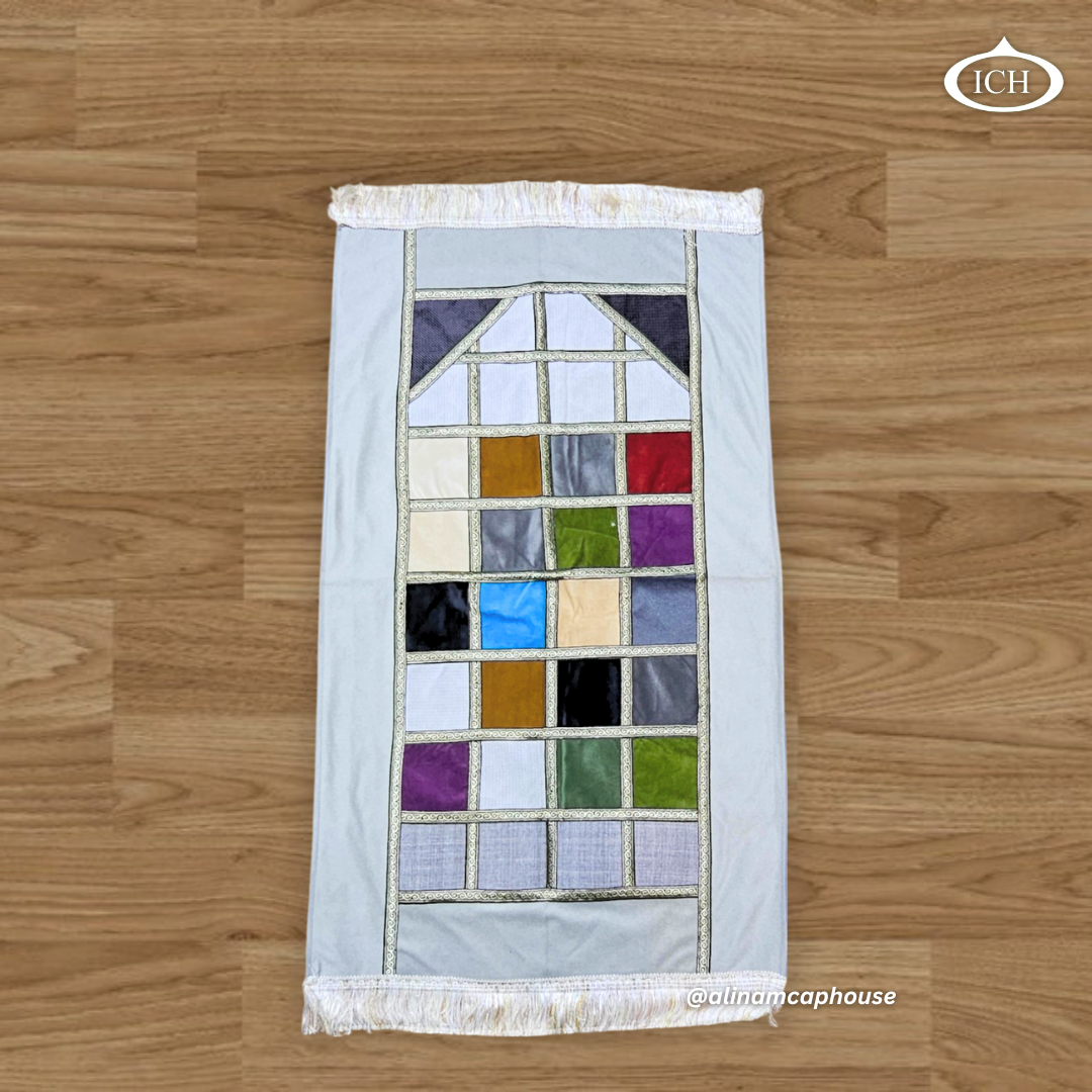 High-quality Grey Islamic Prayer Rug by Al Inam Cap House – Comfortable, durable, and beautifully designed for Muslim worship.