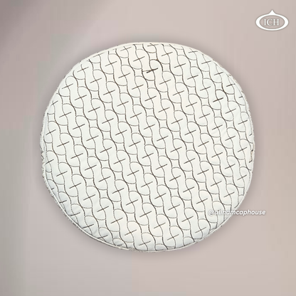 Top view of AL INAM ICH JJ style Islamic prayer cap featuring detailed brown embroidery on cream fabric