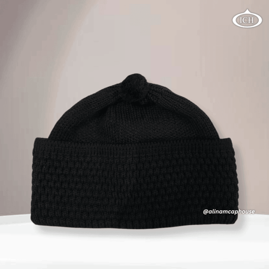 Black knitted Islamic cap, premium Muslim prayer topi, soft cotton knit fabric, elegant handcrafted texture, AL INAM CAP HOUSE