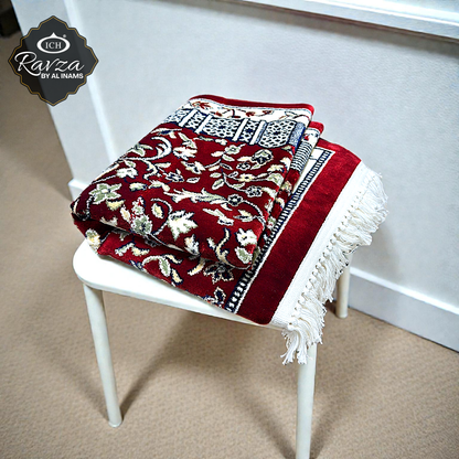 Folded Al Inam Rawda prayer mat displaying thickness and soft padding, luxury Ravza-inspired Islamic musallah designed for knee comfort during tahajjud and Ramadan prayers