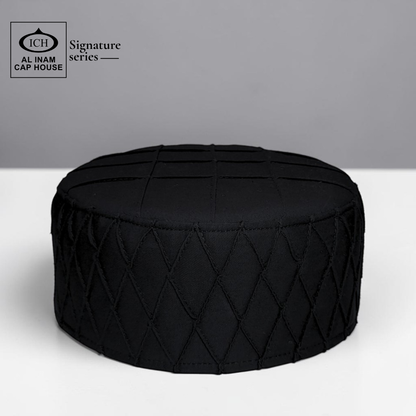 Front top view of AL INAM black Islamic Prayer Cap ICH-0000-A02 featuring premium breathable fabric, detailed stitching and traditional Muslim kufi cap design.