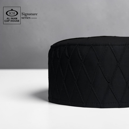 Side view of AL INAM black Muslim prayer cap displaying elegant profile, breathable material and premium kufi cap construction.