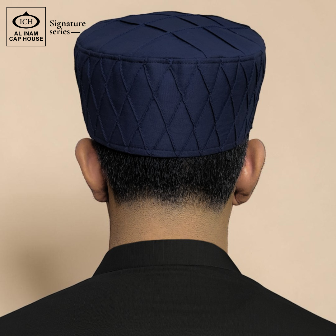 Model view of AL INAM blue Islamic prayer cap showing elegant fit and comfortable daily wear design.