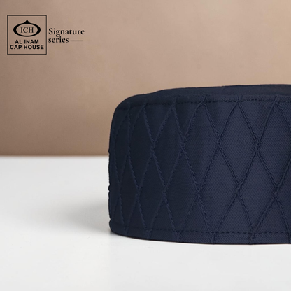 Side view of AL INAM blue Muslim prayer cap highlighting premium craftsmanship and traditional skull cap styling.