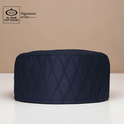 Front view of AL INAM blue Islamic prayer cap with lightweight comfortable construction for everyday Muslim wear.