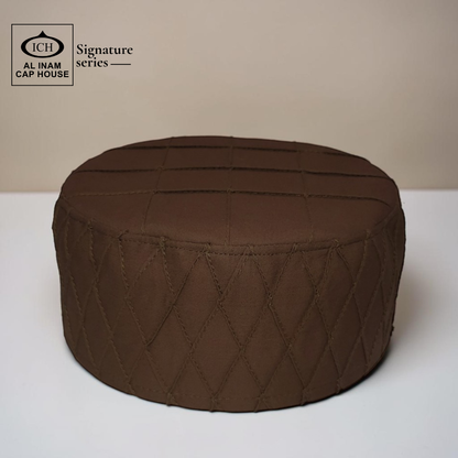 Front top view of AL INAM brown Islamic Prayer Cap ICH-0000-A02 featuring premium breathable fabric and elegant kufi cap design.