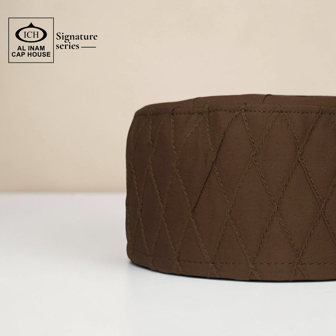 Side view of AL INAM brown Muslim prayer cap displaying breathable fabric and quality craftsmanship.