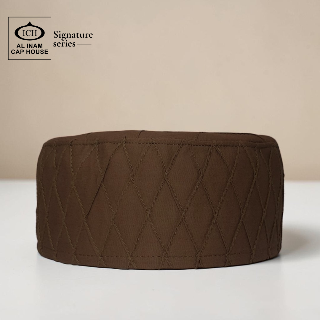 Front view of AL INAM brown Islamic prayer cap designed for comfort and traditional Muslim styling.