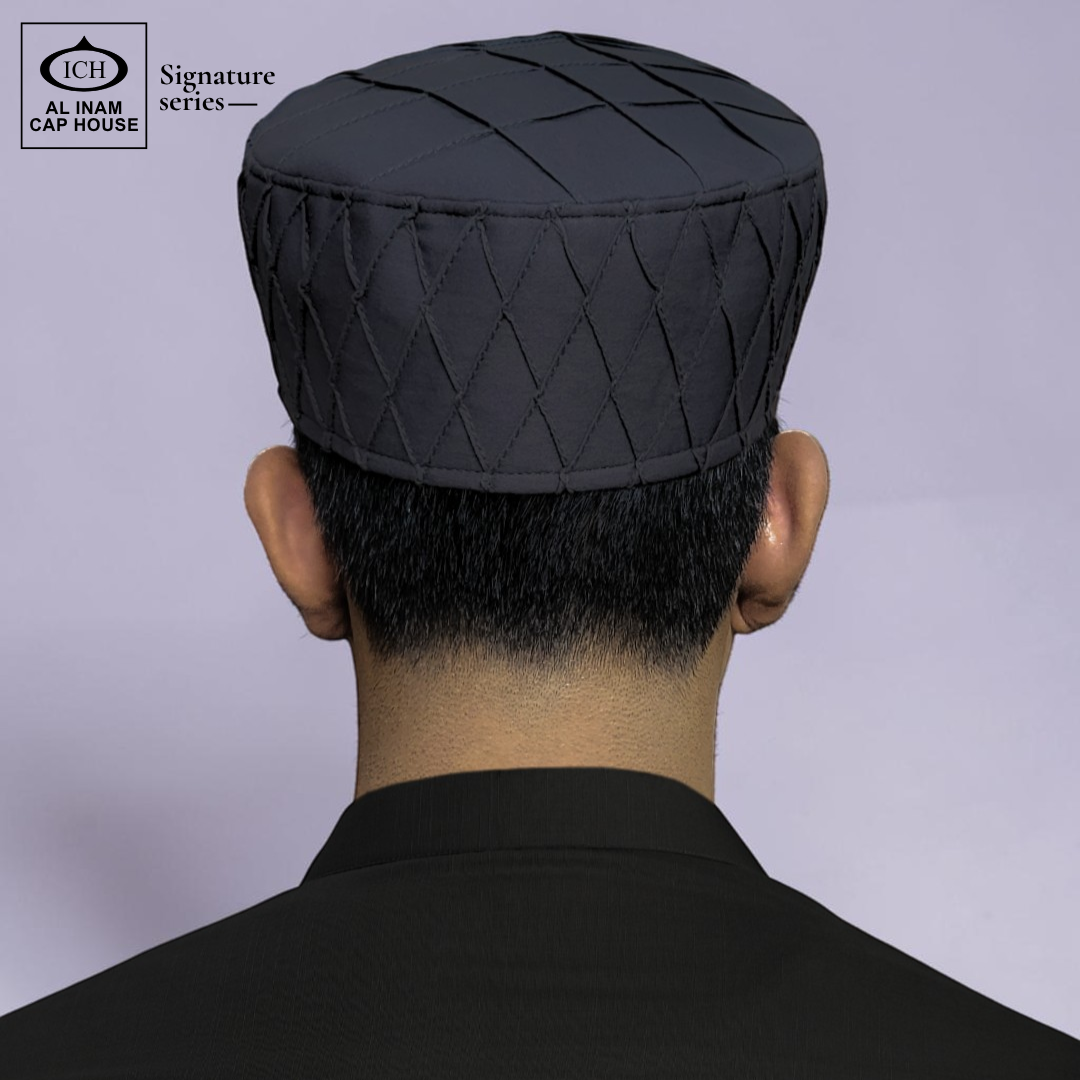 Model view of AL INAM grey Islamic prayer cap showing stylish fit and comfortable daily wear design.