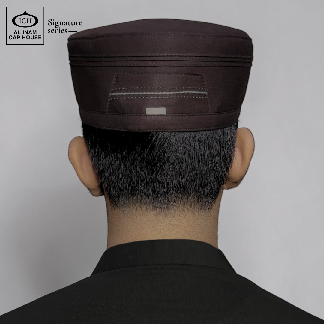 Back worn view of AL INAM Brown Islamic Prayer Cap on model showing proper head fit, secure hold and traditional kufi look for Muslim men during prayer and daily wear.