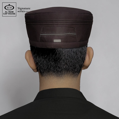 Back worn view of AL INAM Brown Islamic Prayer Cap on model showing proper head fit, secure hold and traditional kufi look for Muslim men during prayer and daily wear.