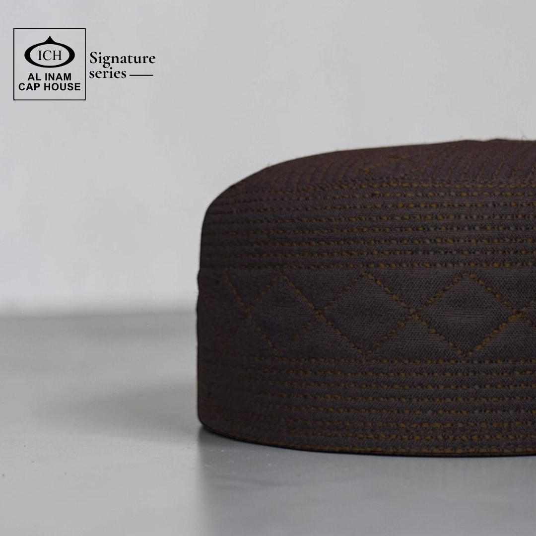 Side view of AL INAM Islamic Prayer Cap displaying breathable material, premium construction and comfortable kufi skull cap design for Muslim men.