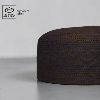Side view of AL INAM Islamic Prayer Cap displaying breathable material, premium construction and comfortable kufi skull cap design for Muslim men.