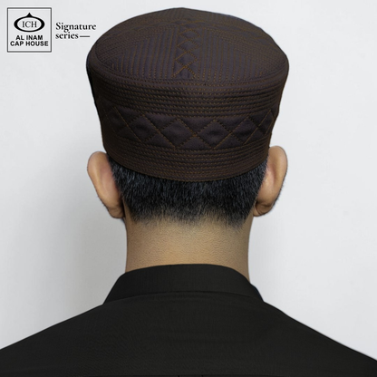 Model view of AL INAM Islamic Prayer Cap showing stylish fitting, soft comfortable wear and elegant traditional Muslim prayer cap appearance.