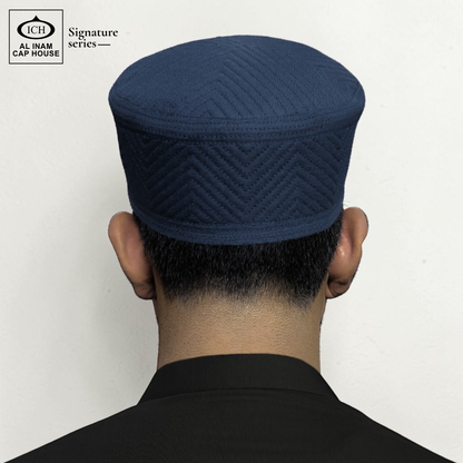 Model wearing AL INAM Islamic Prayer Cap ICH-0000-A08 showcasing comfortable fit, breathable cotton fabric and elegant kufi style suitable for namaz, Jummah prayer, Eid and daily Islamic wear.