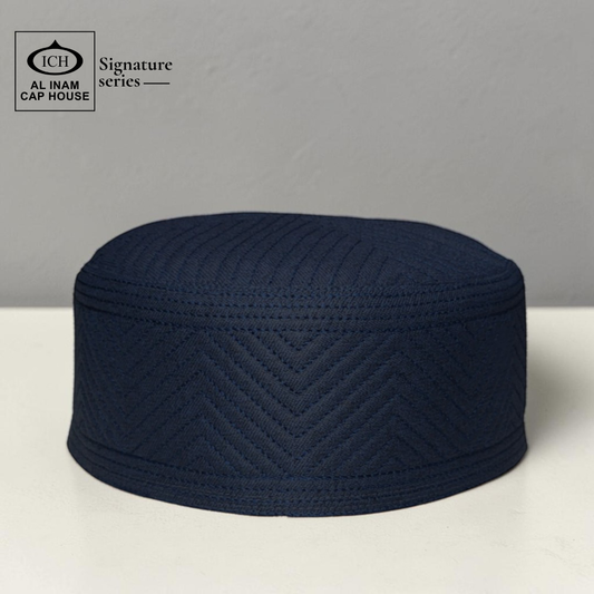 Top front angle of AL INAM Islamic Kufi Cap highlighting refined stitching, premium cotton craftsmanship and classic Islamic design suitable for masjid and religious gatherings.