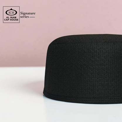 Side view of AL INAM Islamic Prayer Cap displaying breathable construction, comfortable fit and premium kufi skull cap craftsmanship for Muslim men.