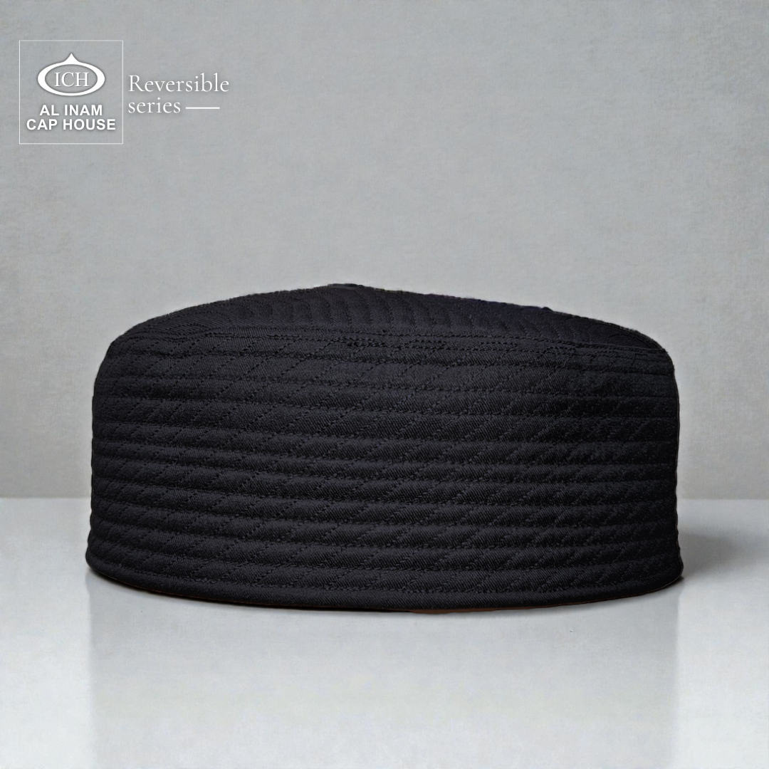 Front view of AL INAM Black Reversible Islamic Prayer Cap A-12 crafted from premium breathable cotton fabric with dual-sided design, elegant embroidery and lightweight kufi skull cap for Muslim men, ideal for namaz, Jummah prayer, Eid, Umrah and everyday Islamic wear.