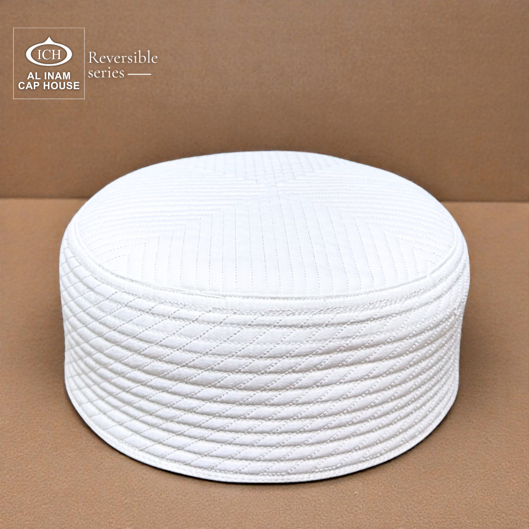 Front and top view of AL INAM White Reversible Islamic Prayer Cap A-12 showcasing premium cotton construction, reversible dual-sided design, intricate embroidered detailing and breathable comfort for Muslim men during daily prayers and special Islamic occasions.