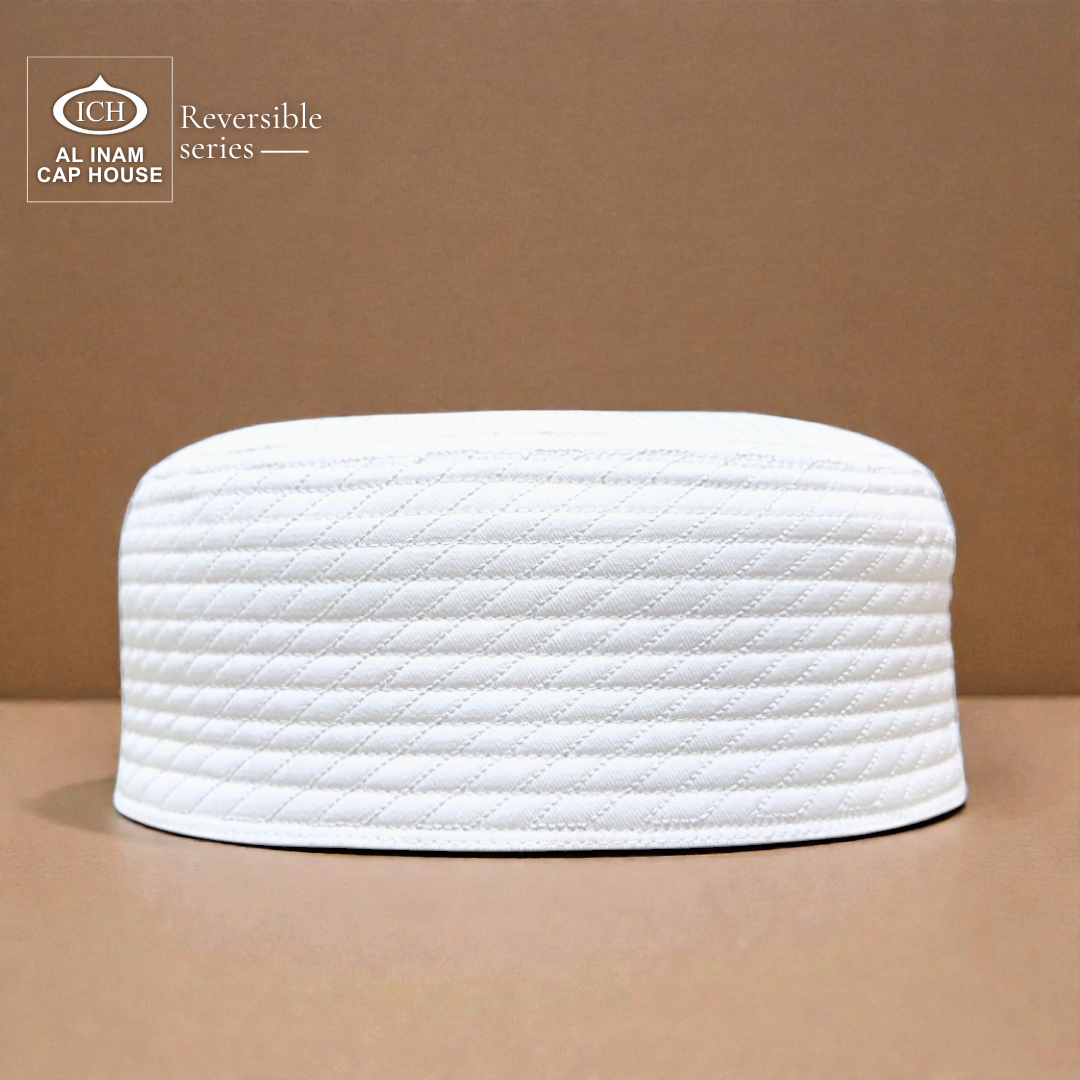 Front view of AL INAM White Reversible Islamic Prayer Cap A-12 crafted from premium breathable cotton fabric with dual-sided reversible design, elegant embroidery and lightweight kufi skull cap for Muslim men, perfect for namaz, Jummah prayer, Eid, Umrah and everyday Islamic wear.