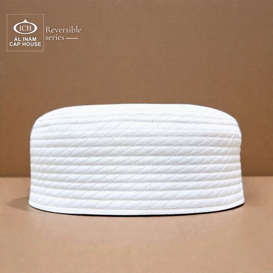 Front view of AL INAM White Reversible Islamic Prayer Cap A-12 crafted from premium breathable cotton fabric with dual-sided reversible design, elegant embroidery and lightweight kufi skull cap for Muslim men, perfect for namaz, Jummah prayer, Eid, Umrah and everyday Islamic wear.