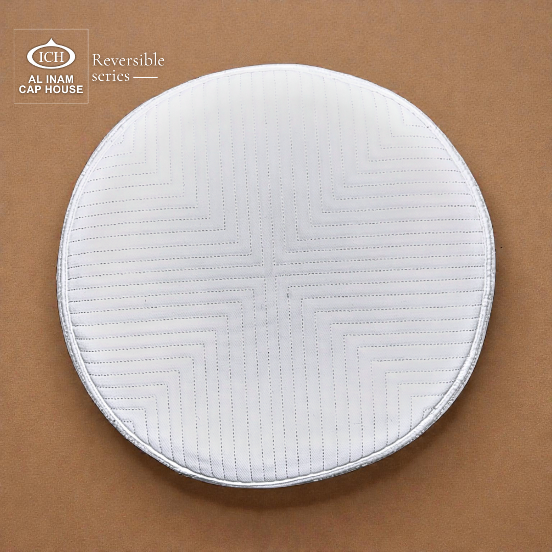 Top view of AL INAM White Reversible Islamic Prayer Cap A-12 highlighting symmetrical embroidered craftsmanship, premium cotton fabric, lightweight reversible construction and classic kufi skull cap for everyday Islamic wear.