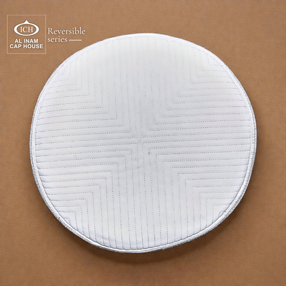 Top view of AL INAM White Reversible Islamic Prayer Cap A-12 highlighting symmetrical embroidered craftsmanship, premium cotton fabric, lightweight reversible construction and classic kufi skull cap for everyday Islamic wear.