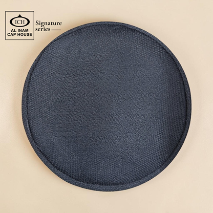 Top view of AL INAM Black and White Islamic prayer cap featuring clean pattern design, lightweight breathable cotton and flexible fit.