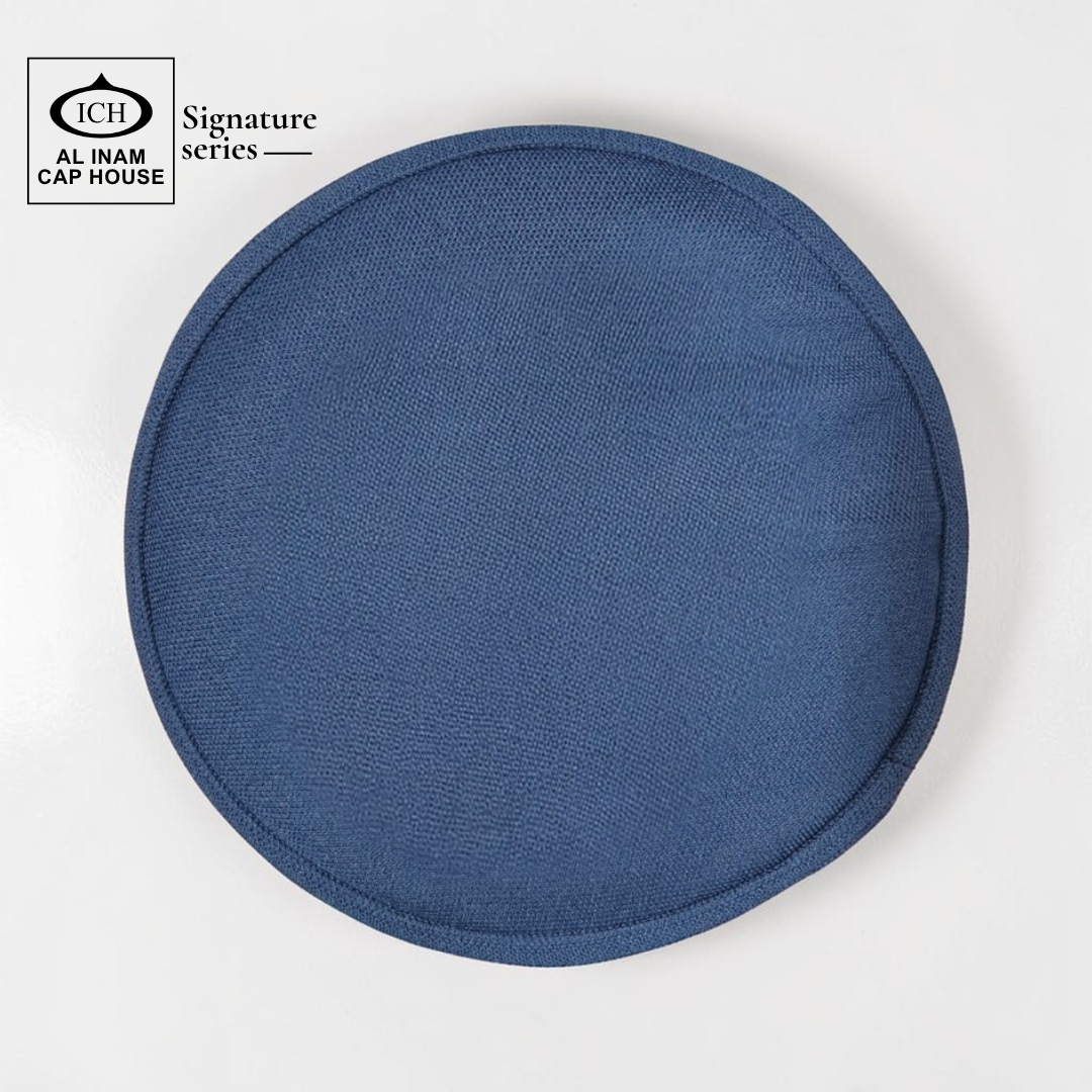 Top view of AL INAM Blue Islamic cap featuring clean pattern and breathable cotton construction.